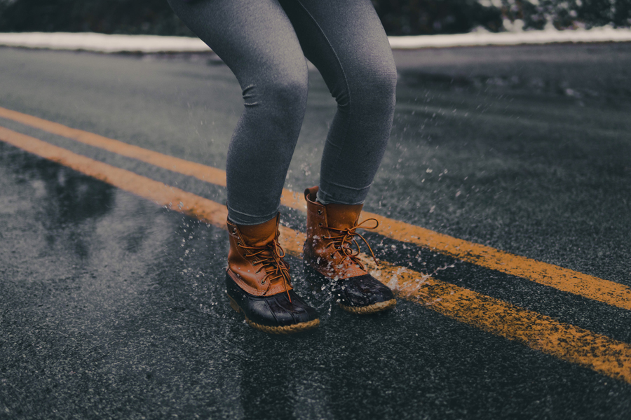 waterproof boots splashing a water