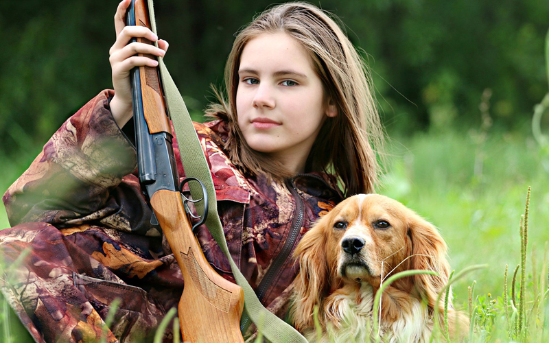 woman holding a riffle