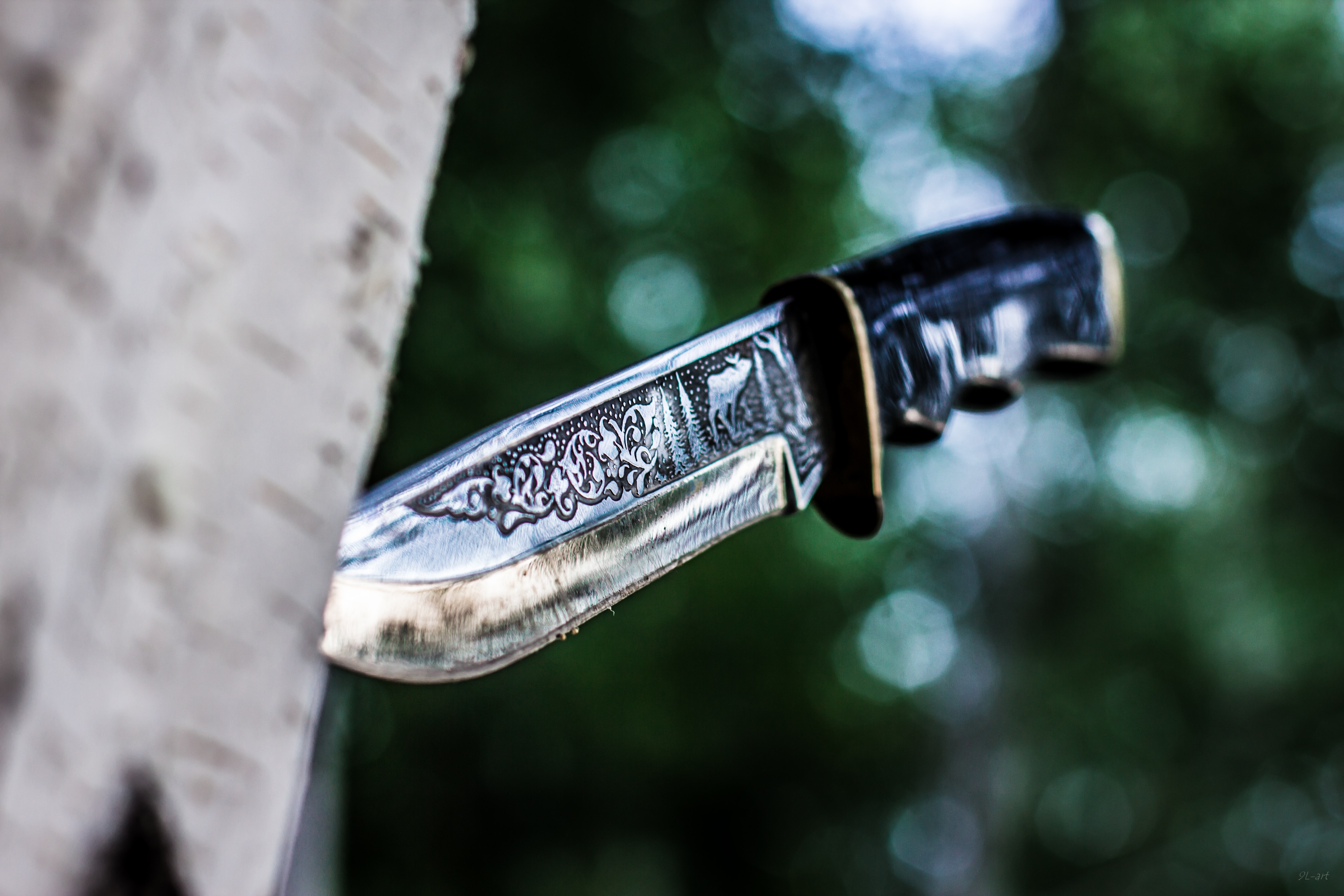 a hunting knife with an engraving